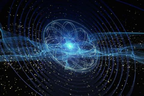 Abstract digital illustration of a glowing blue particle surrounded by swirling wave patterns and orbit-like lines, representing concepts of quantum physics or atomic energy.
